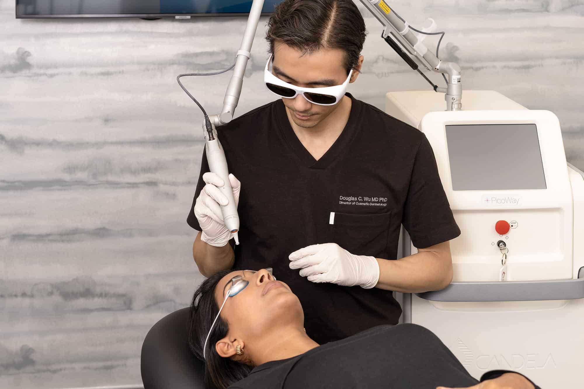 Dr. Douglas Wu Performing a laser procedure on a female patient